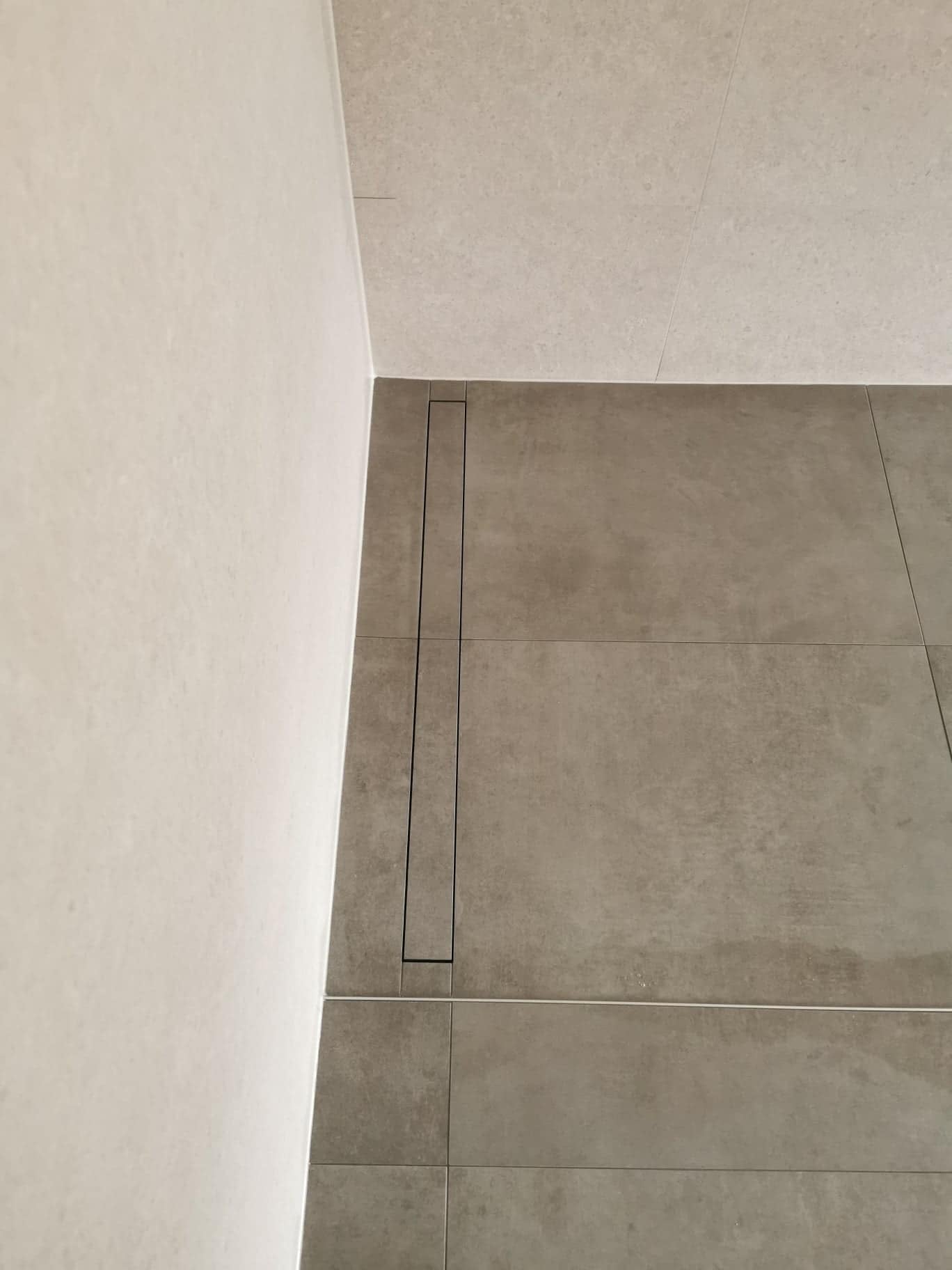 Installation douche italienne paroi vitrée - Carreleur Belgique