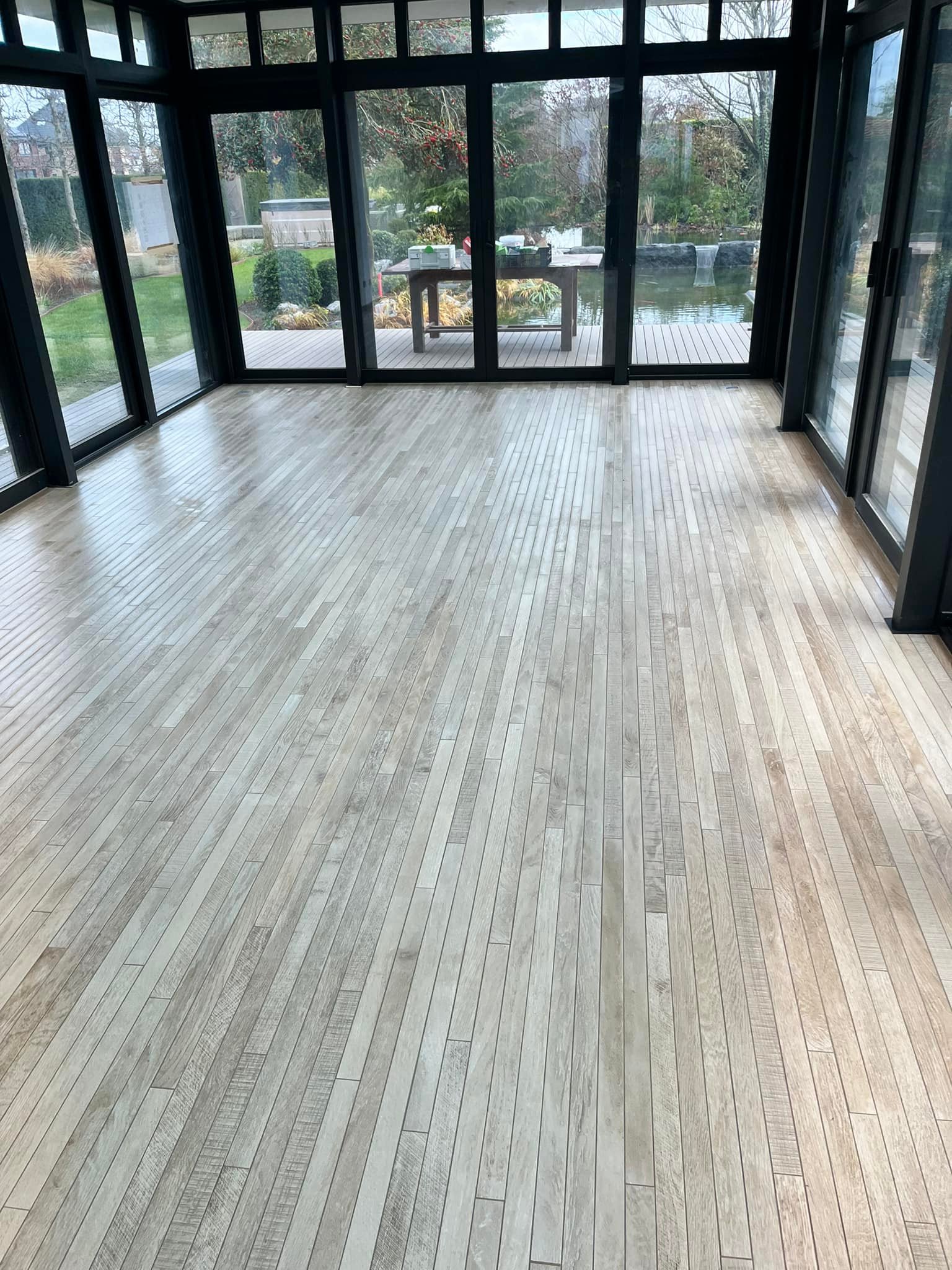 Carrelage sol véranda extension maison - Carreleur Belgique